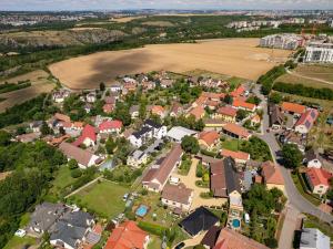 Prodej bytu 6+kk a větší, Praha - Holyně, náměstí Pod lípou, 148 m2